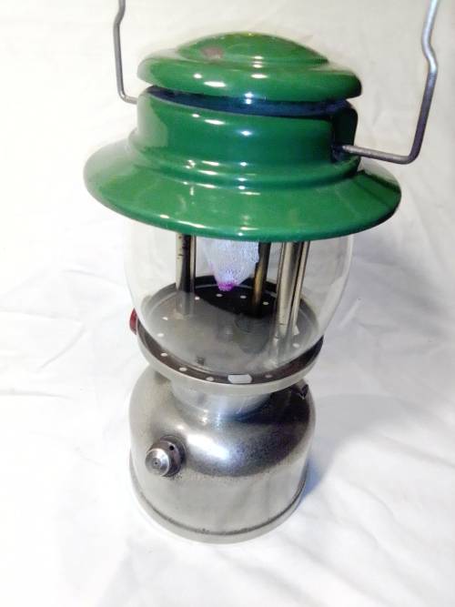 A Ex SAP Canadian `Colman` lamp Mft 1973 and a 4 slice Toaster. In good condition for its age.