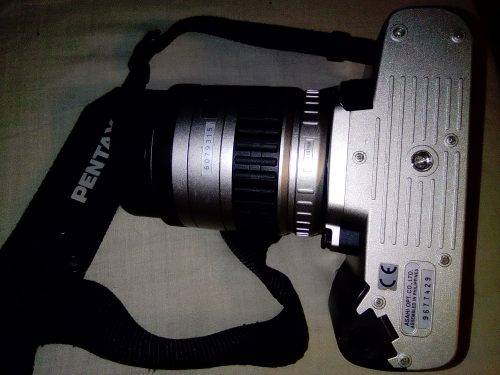 A Pentax AZ50 with 28-80mm lens in carry bag. In fair used condition.