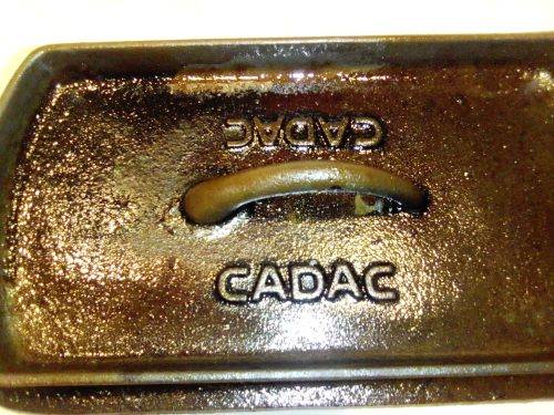 A Cadac castiron bread Lidded pot with handle for camping. Rare and Scarce.