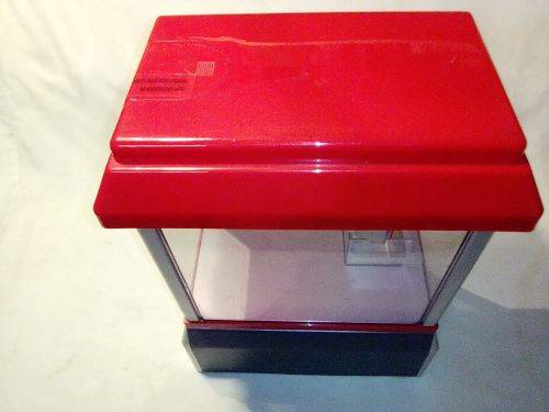 A `Toy Grab Machine` been in storage a long time bu still in good condition for age.
