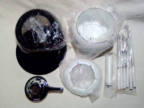 Brand New and clean. An Estate find, a German, Complete and boxed white enamel Fondue.