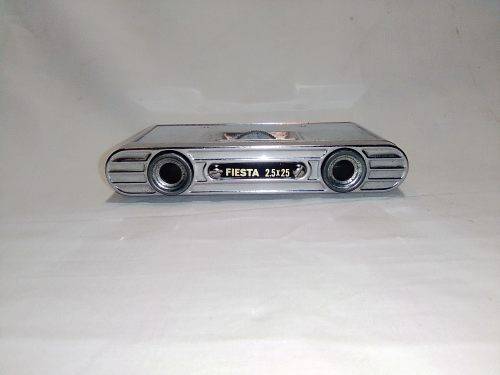 Old vintage folding Fiesta Opera glasses. Rare in fair condition.