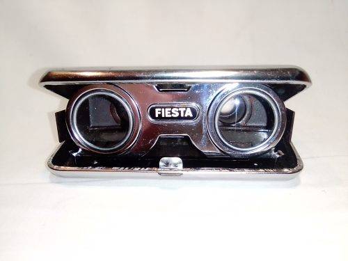 Old vintage folding Fiesta Opera glasses. Rare in fair condition.