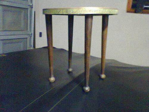 A very old vintage Brass top orental side table.  an Impresive piece.