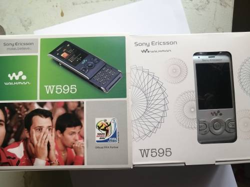 Vintage Sony Ericsson cellphone with Charger - W595