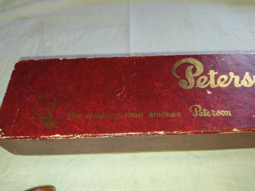 Peterson smoking pipe combination.