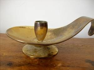 BRASS CANDLE HOLDER.  NEEDS A GOOD CLEAN.