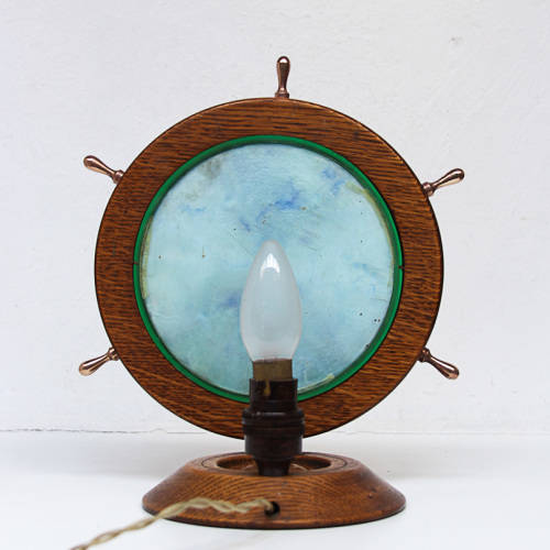UNUSUAL LIGHT OF A SHIP WHEEL CONTAINING AN AQUARIUM - OAK, BRASS, PERSPEX - 1970's