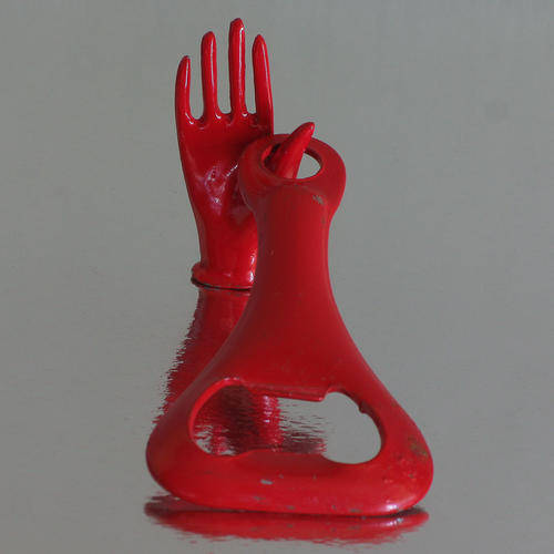 VINTAGE RED BOTTLE OPENER AND RED HAND, METAL