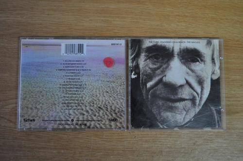 The Cure - Singles Standing on a Beach