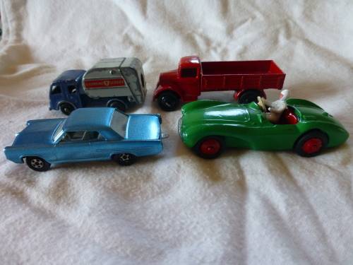 Dinky Toy Farm wagon,Dinky Aston Martin and Matchbox Pontiac GP Sports Coupe and other.