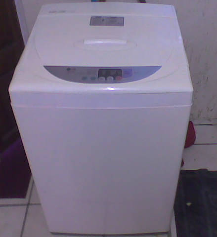 LG Fuzzy Logic - top loader 8kg - ( model WF-T7014PP ) washing machine.