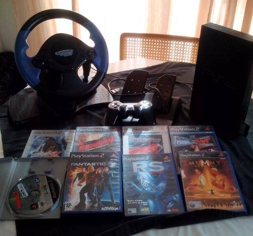 Sony PlayStation 2+ Steering wheel and games