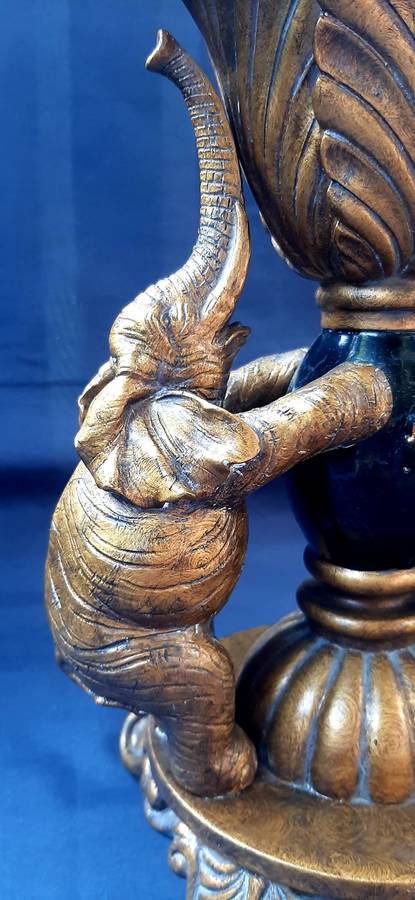 LARGE VINTAGE TABLE STAND DECORATED WITH ELEPHANTS