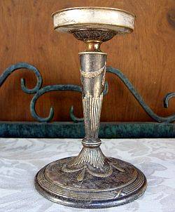 An antique WMF candle holder