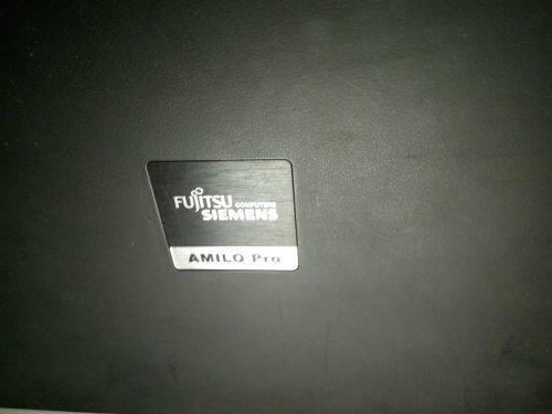 Fujitsu Siemans Amilo Pro!! PLEASE READ!!**** (BID FOR SPARES)!!  INCLUDES WIRED MOUSE AND CHARGER