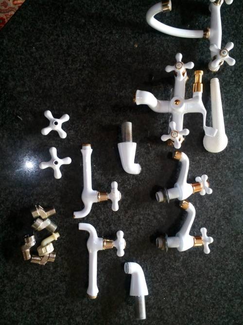 Full Set of White and Gold Bathroom Taps