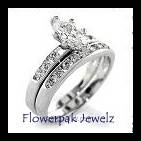 **FREE R50.00 gift**1 carat clear CZ  diamond cladded in 14kt white gold wedding ring size 10