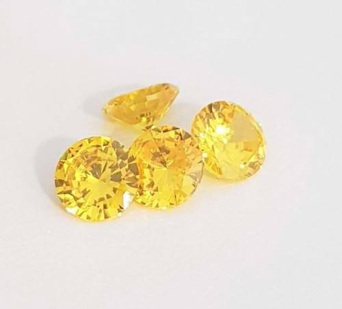 Cubic Zirconia 7.0mm Yellow Round Cut** Master Cut**
