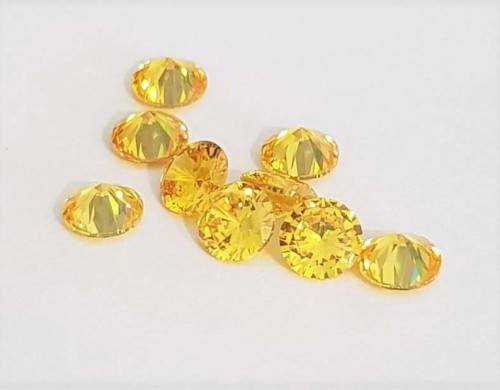 Cubic Zirconia 7.0mm Yellow Round Cut** Master Cut**