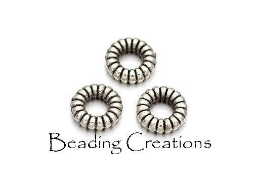 SPACERS - CONNECTORS - RINGS - ANTIQUE SILVER - DONUT - 4x2mm - 10 PCS