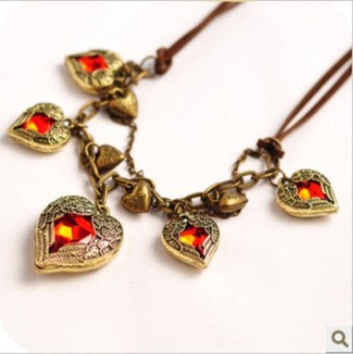 NECKLACE - ANGEL WINGS HEART IN BRONZE AND RED CRYSTALS WITH FAUX LEATHER