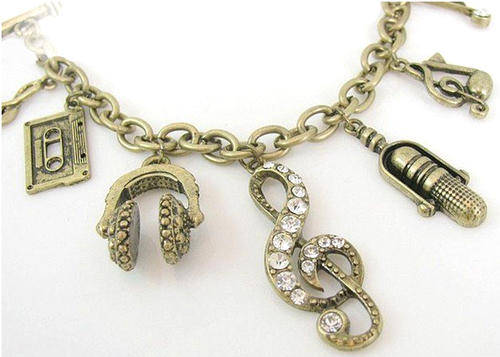 VINTAGE BRONZE MUSICAL CHARM BRACELET