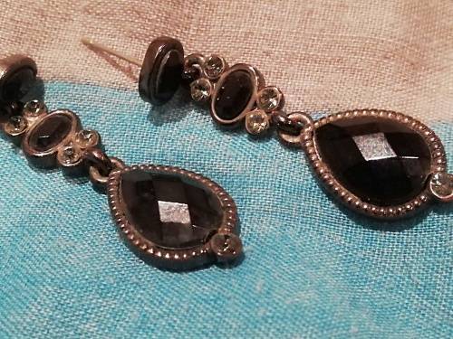 8 x dangle earrings, some with glass or gems. And one wire cross, Bulk sale together.