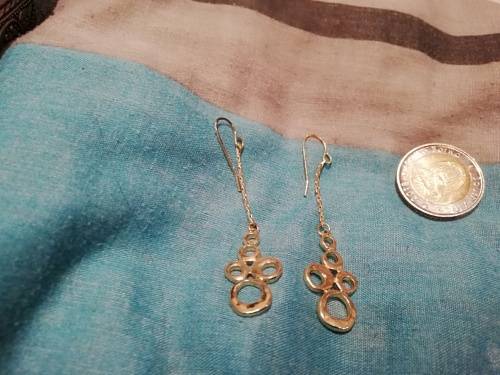8 x dangle earrings, some with glass or gems. And one wire cross, Bulk sale together.