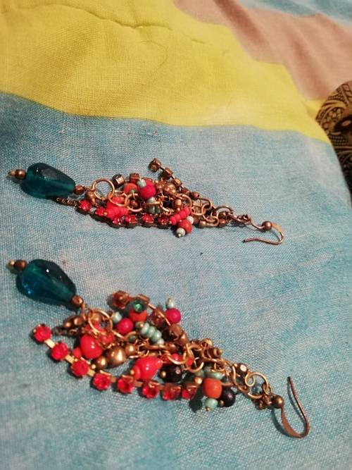 8 x dangle earrings, some with glass or gems. And one wire cross, Bulk sale together.