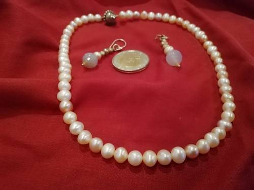 Freshwater pearl necklace and earrings.