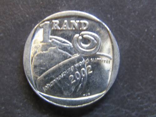 THIS IS A 2002 WORLD SUMMIT R1 COIN IN ZIP-LOCK BAG THAT YOU ARE BIDDING ON
