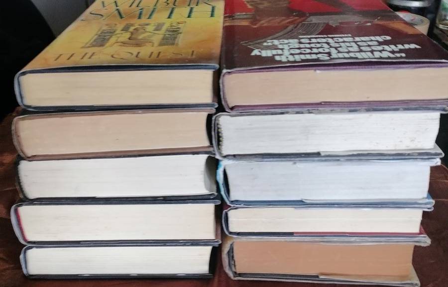 10 x Wilbur Smith h/c books, all in one lot.