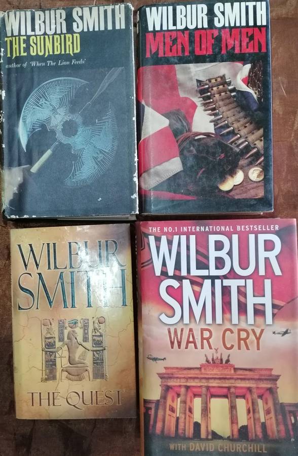 10 x Wilbur Smith h/c books, all in one lot.