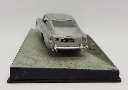 Aston Martin DB5 - Goldfinger model car  - casing cracked, broken mirror and missing light