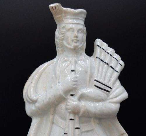 ANTIQUE STAFFORDSHIRE FIGURINE OF SCOTSMAN WITH BAGPIPES - from SUEZYT