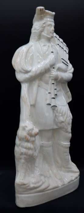 ANTIQUE STAFFORDSHIRE FIGURINE OF SCOTSMAN WITH BAGPIPES - from SUEZYT