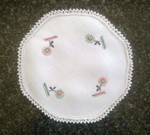 Linen hand embroidered doilie with crochet edge 20cm