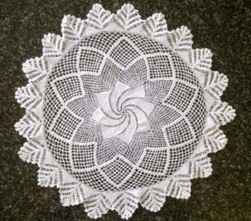 Fine delicate antique white crochet doilie with pinwheel centre 32cm