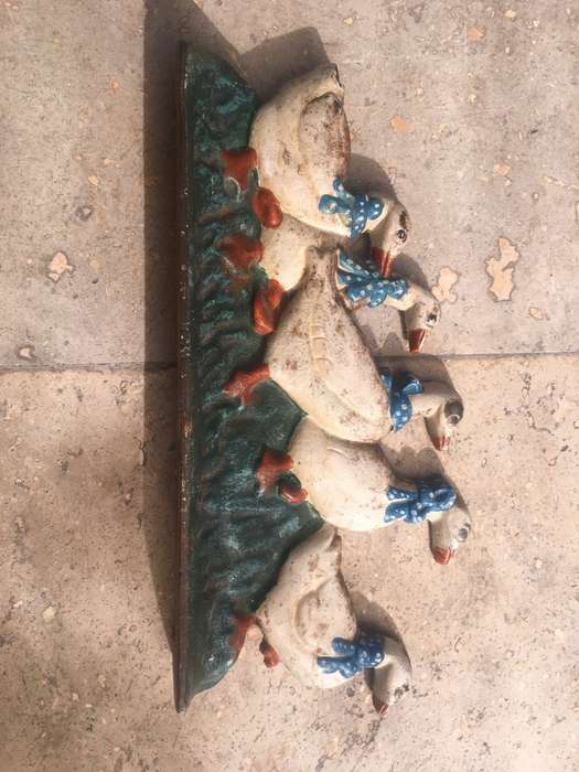 vintage cast iron metal door stop duck family