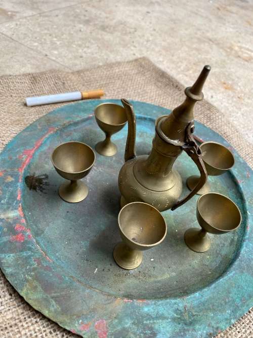 vintage miniature brass turkish tea set on copper plate