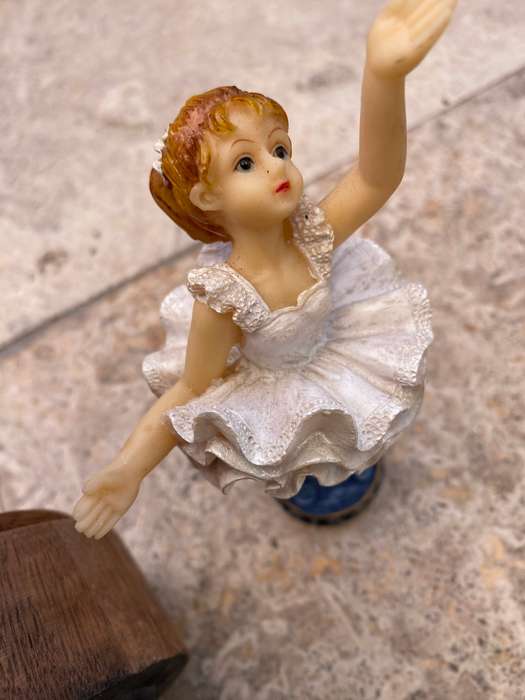 Vintage musical wind up turning wood pedestal with ballerina girl figure