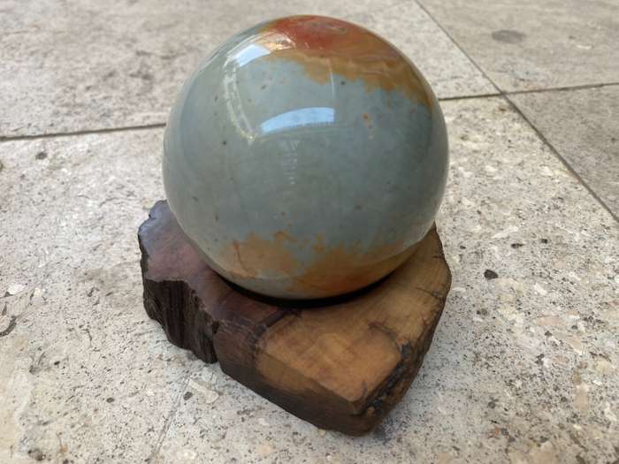 Jasper Polished precious stone sphere 8 cm diameter 24 c, circumference on carved wood base