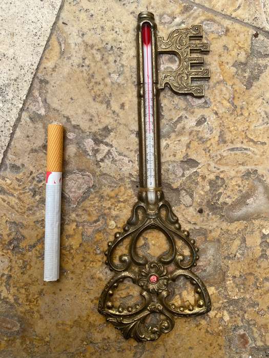Vintage brass key thermometer in key box