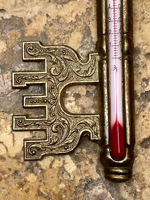 Vintage brass key thermometer in key box