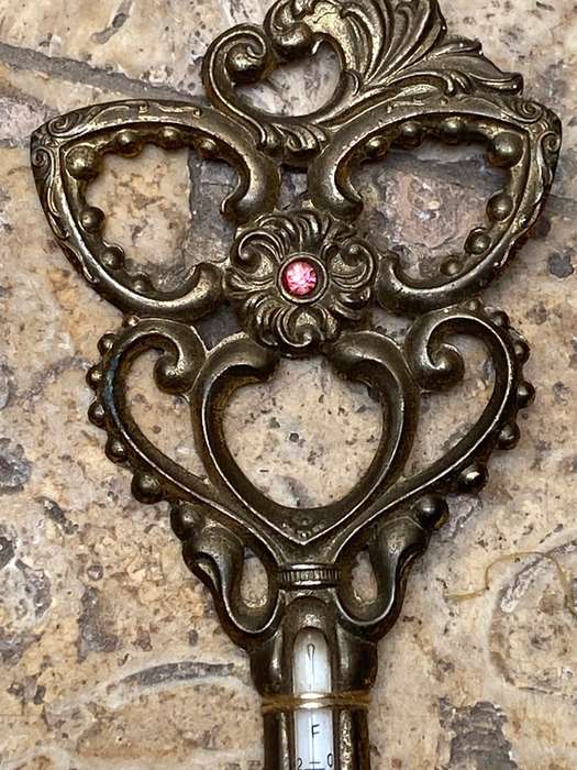 Vintage brass key thermometer in key box