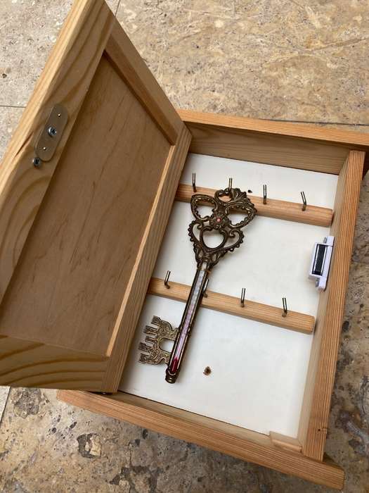 Vintage brass key thermometer in key box
