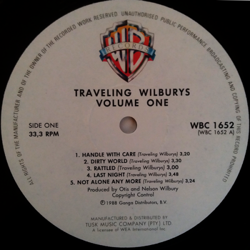 The Travelling Wilburys volume One vinyl lp released 1988 (VG/Ex VG+)