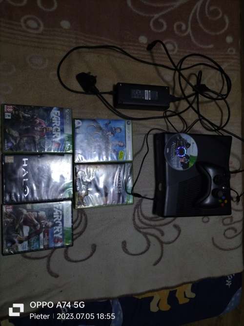 Xbox 360 console with games