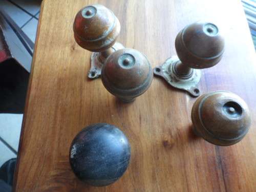 Awesome find of vintage solid brass door knobs 2 complete pairs  plus one beautiful wooden one only